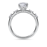 Round Solitaire with Diamond Shouldered Band