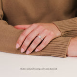 Round Solitaire with Diamond Shouldered Band